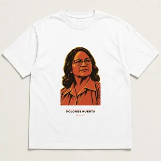 Front of a white tee carrying the civic modern Dolores Huerta design